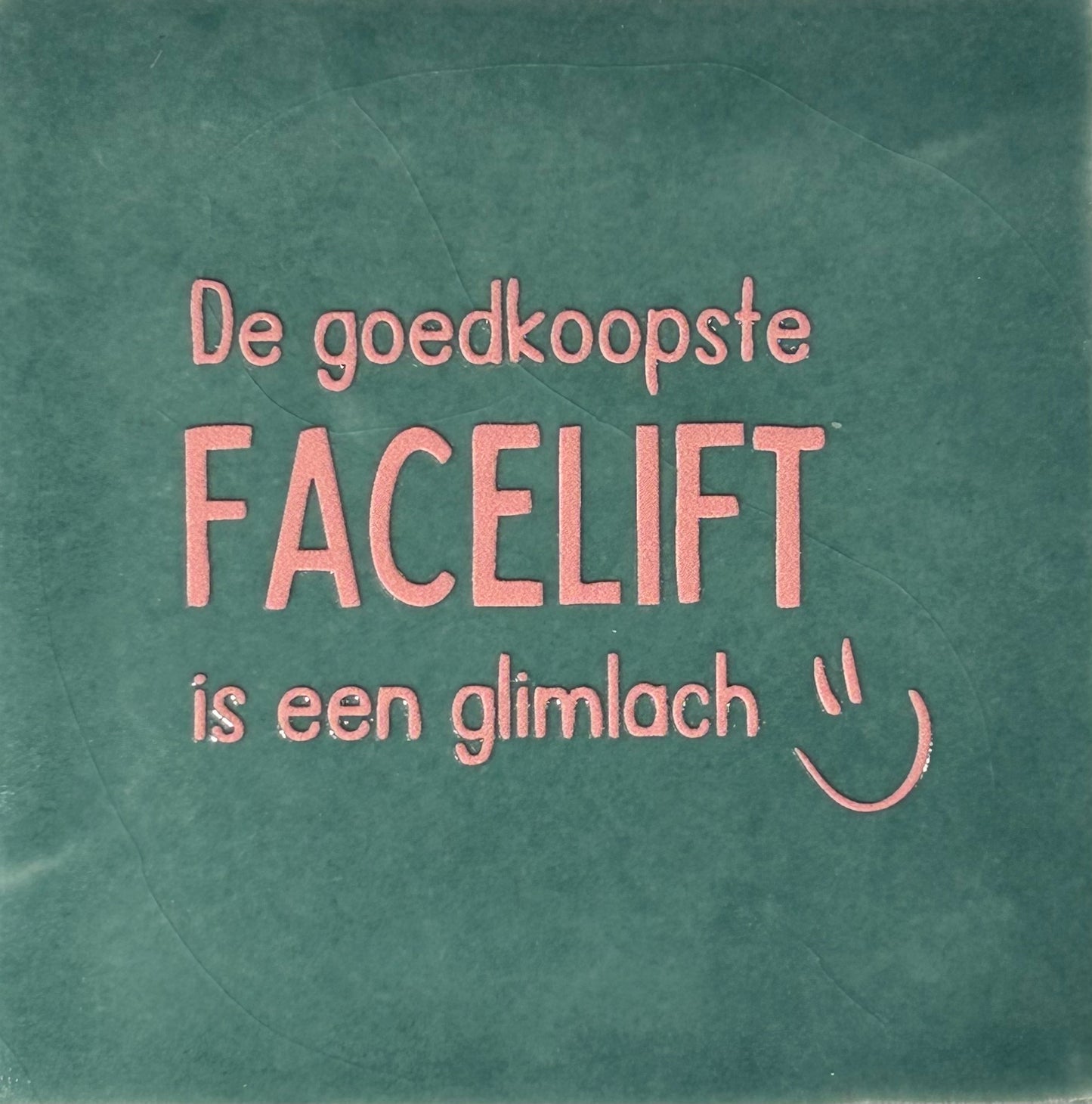 Quote tegeltje 'de goedkoopste facelift is een glimlach' zeegroen/zalm