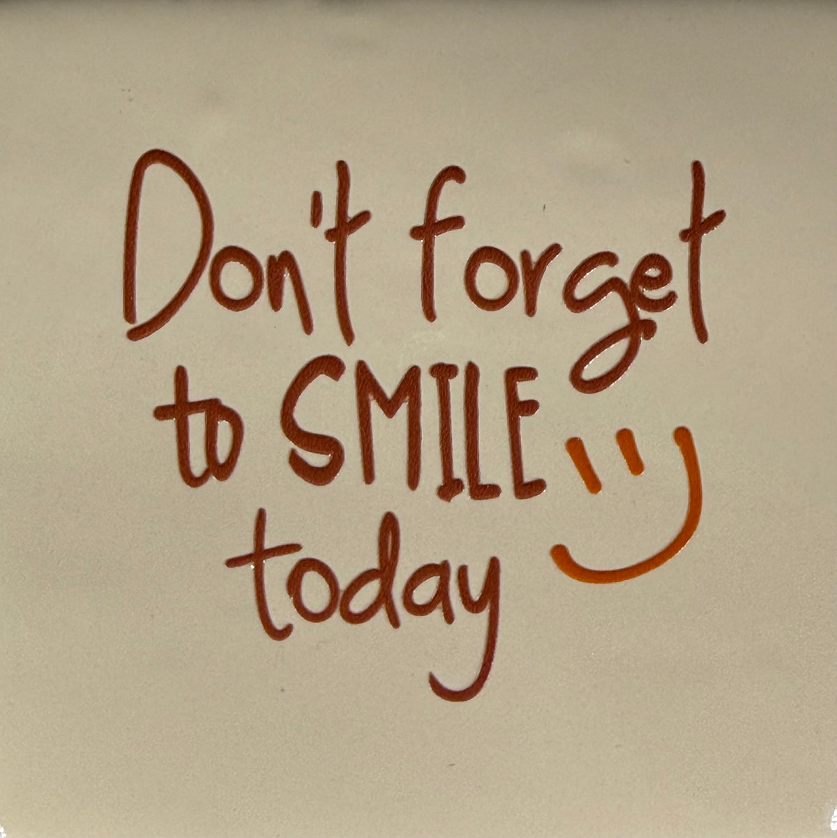 Quote tegeltje 'don't forget to smile' nieuw creme/taupe(oranje)