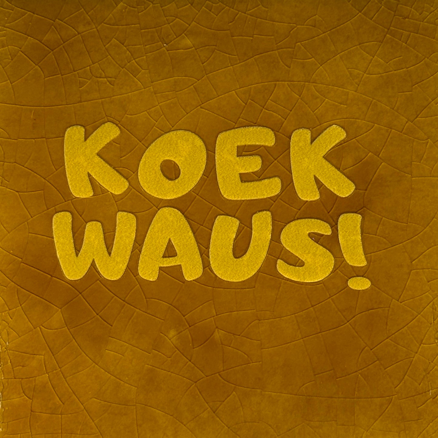 Quote tegeltje 'Koekwaus' nieuw oker/geel