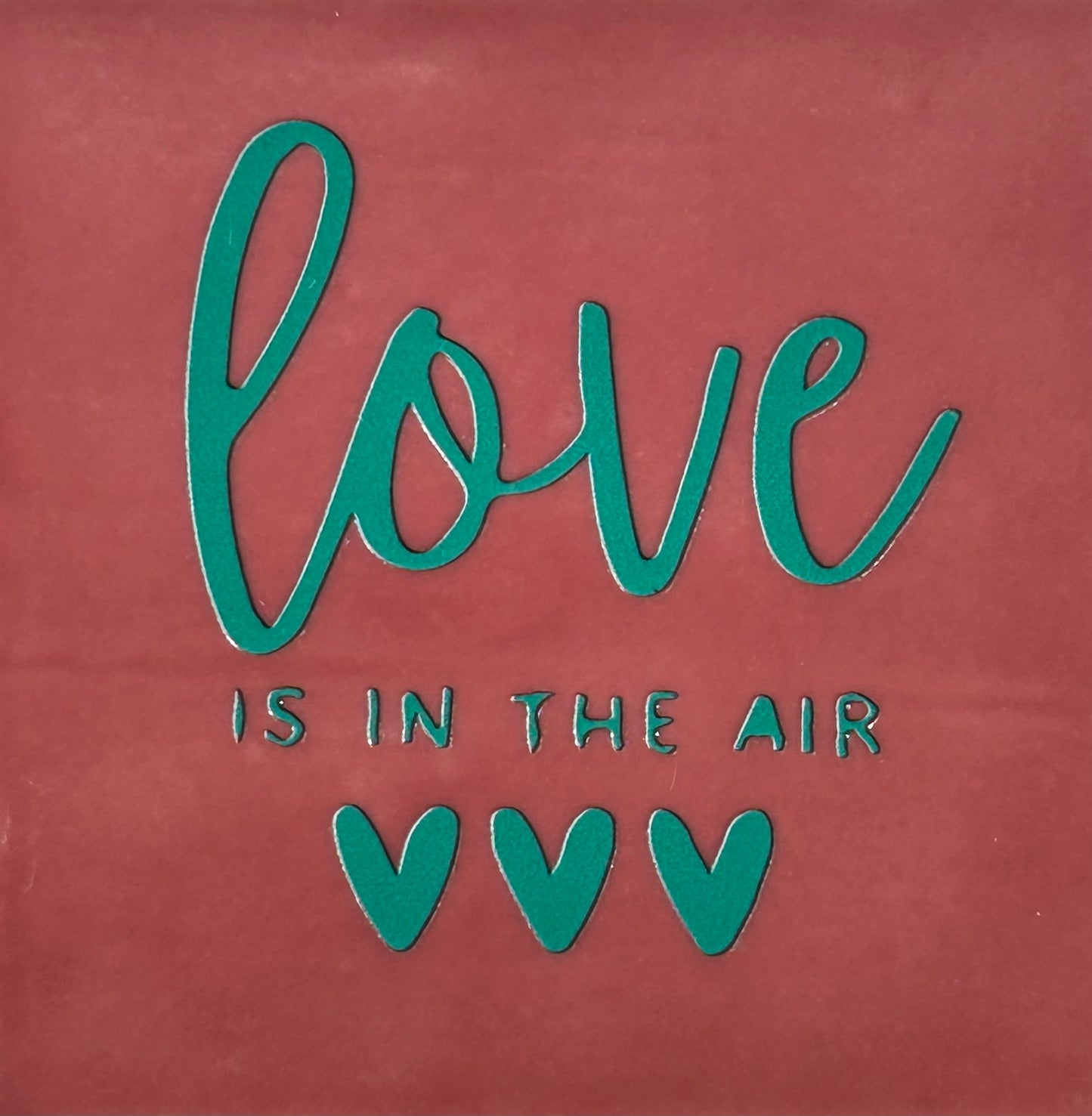 Quote tegeltje 'Love is in the air' roze/aqua