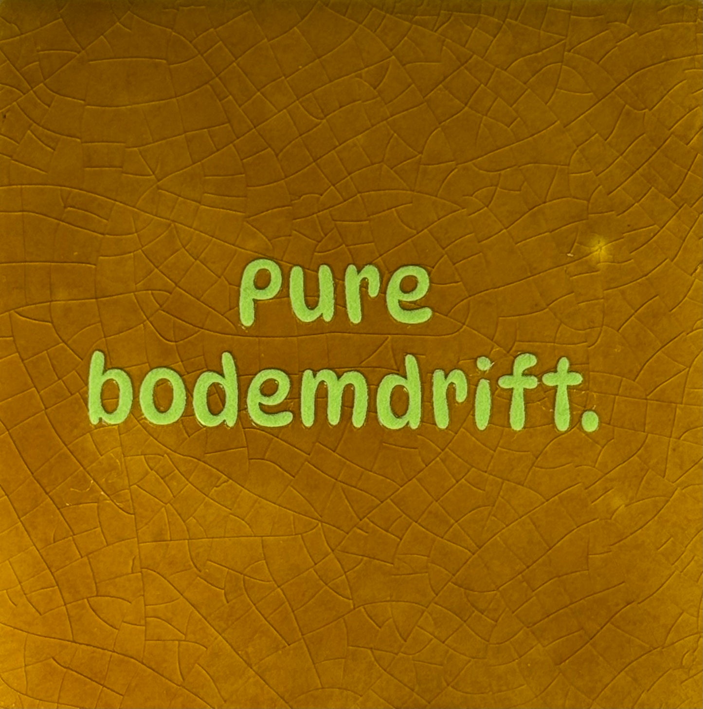 Quote tegeltje 'pure bodemdrift' oker/lime