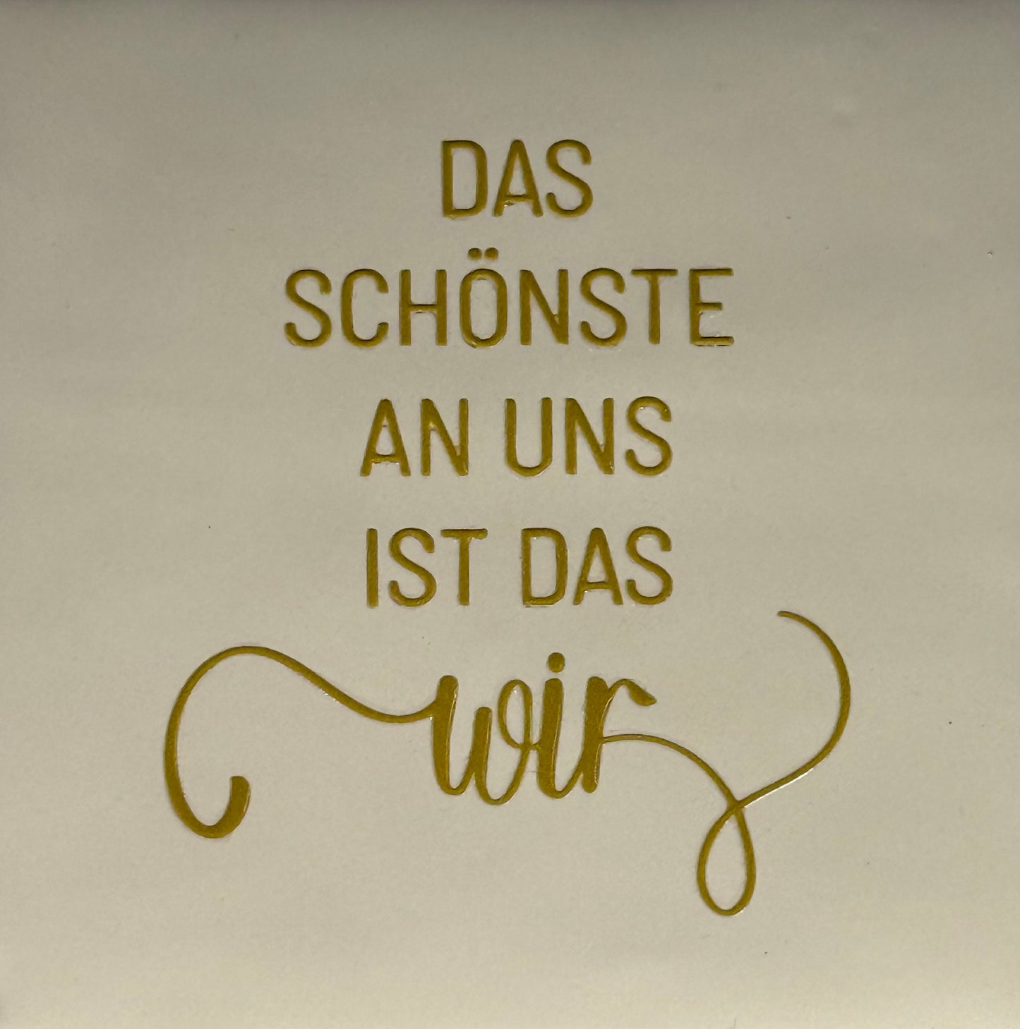 Quote tegeltje 'das schonste an uns…' creme/goud