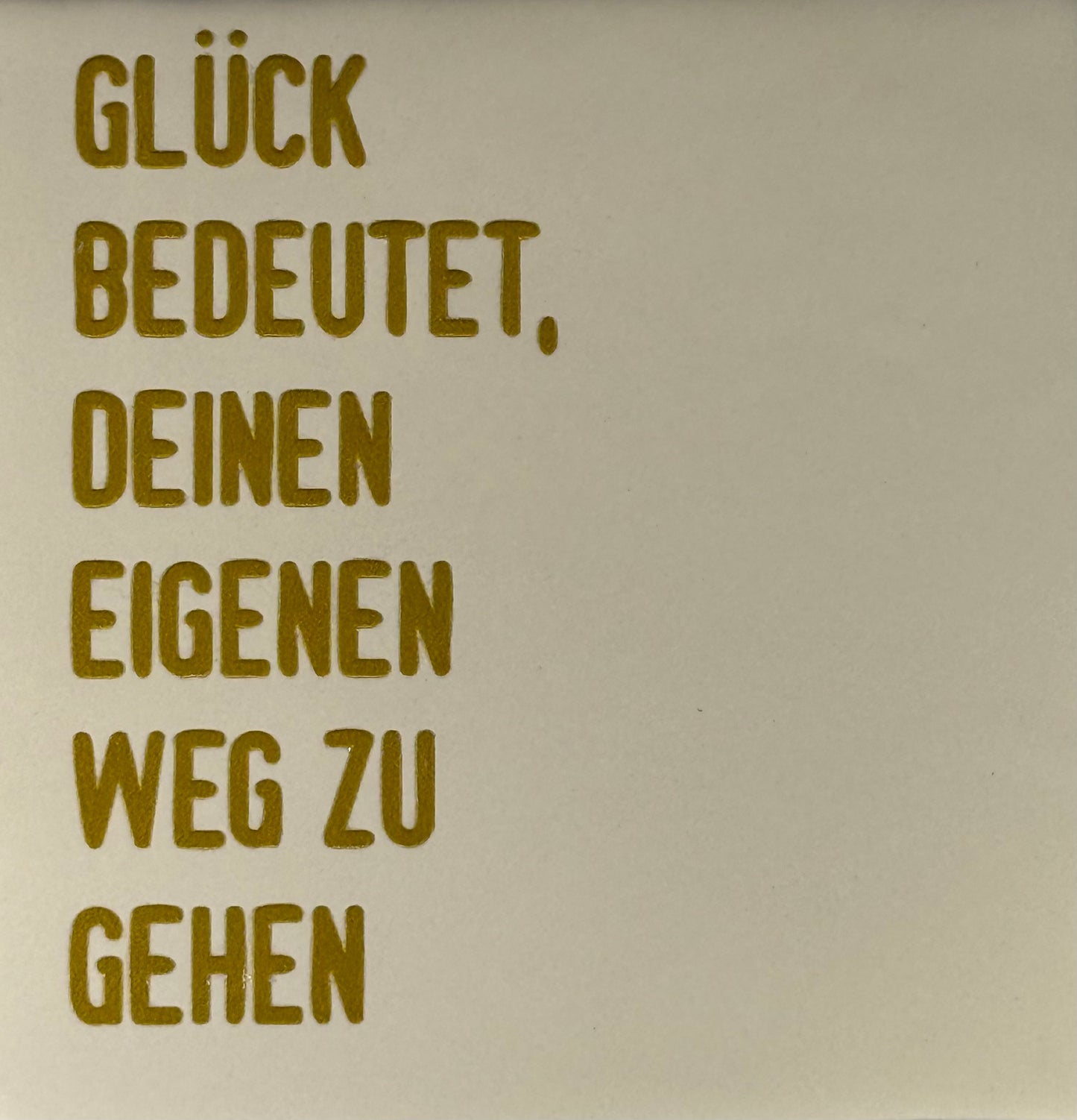 Quote tegeltje 'glück bedeutet...' creme/goud
