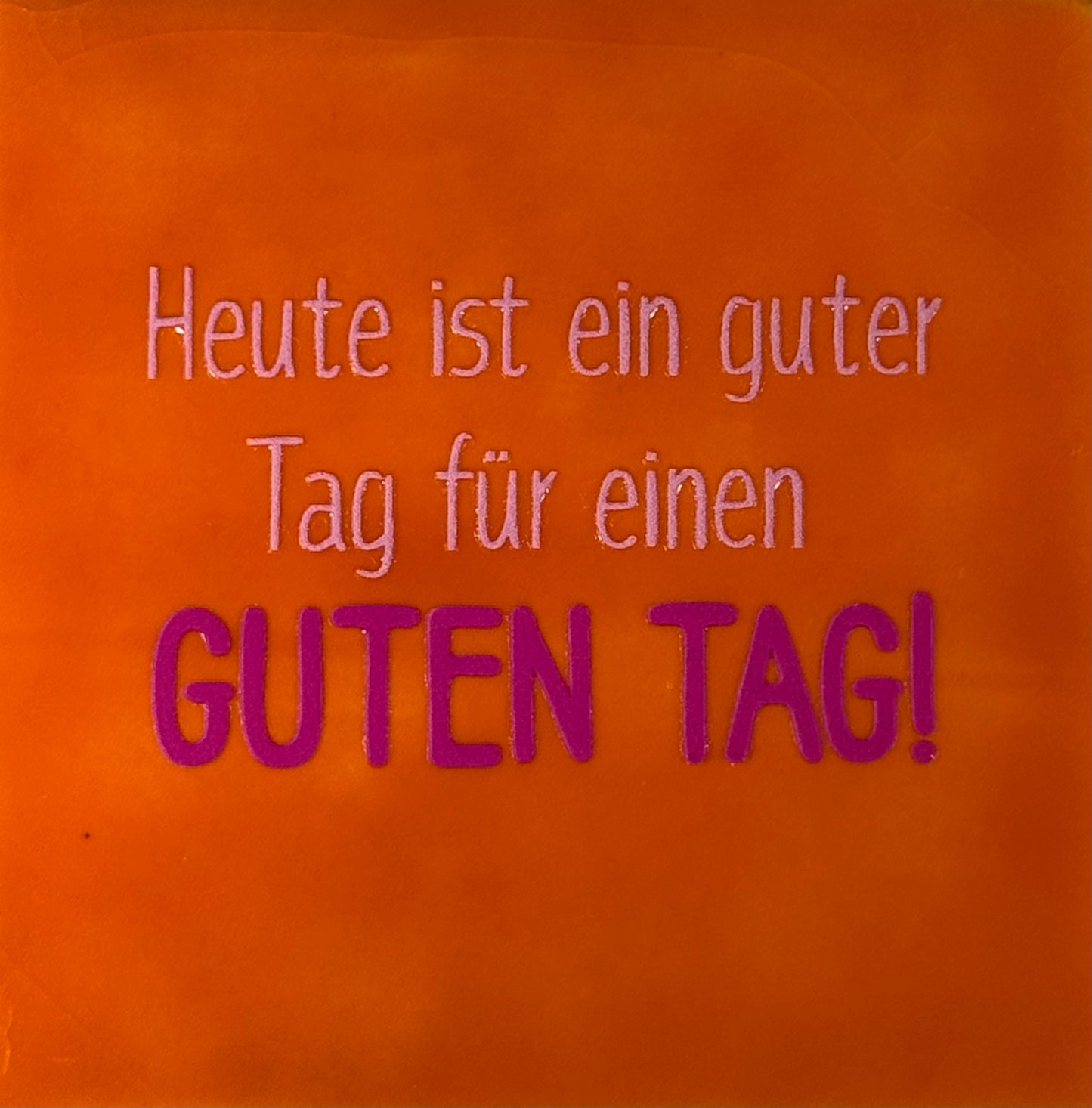 Quote tegeltje 'heute ist ein guter tag...' oranje/knalroze(warmroze)