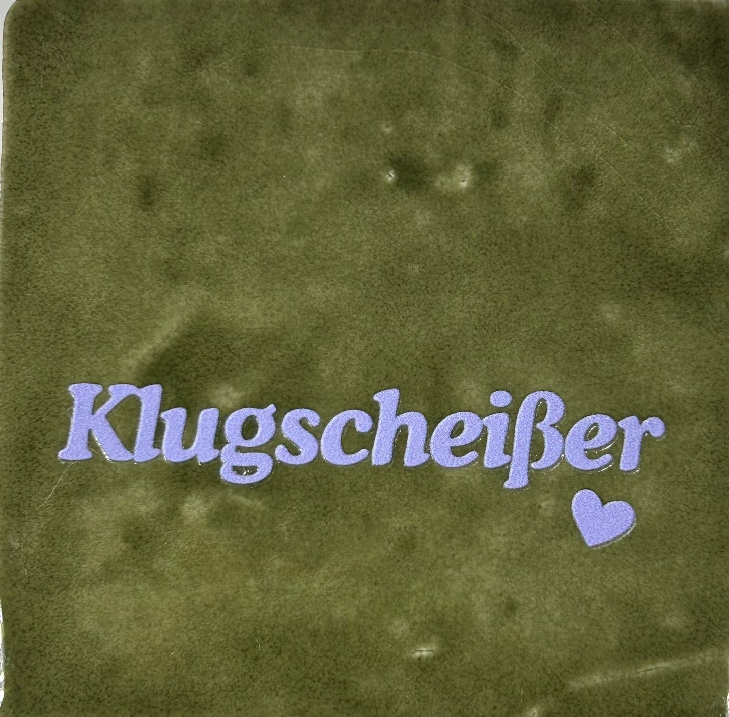 Quote tegeltje 'klugscheisser' olijf/lila