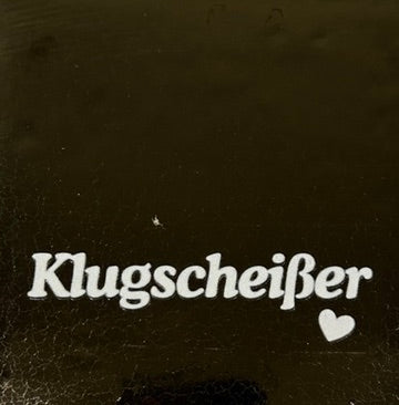 Quote tegeltje 'klugscheisser' goud/creme