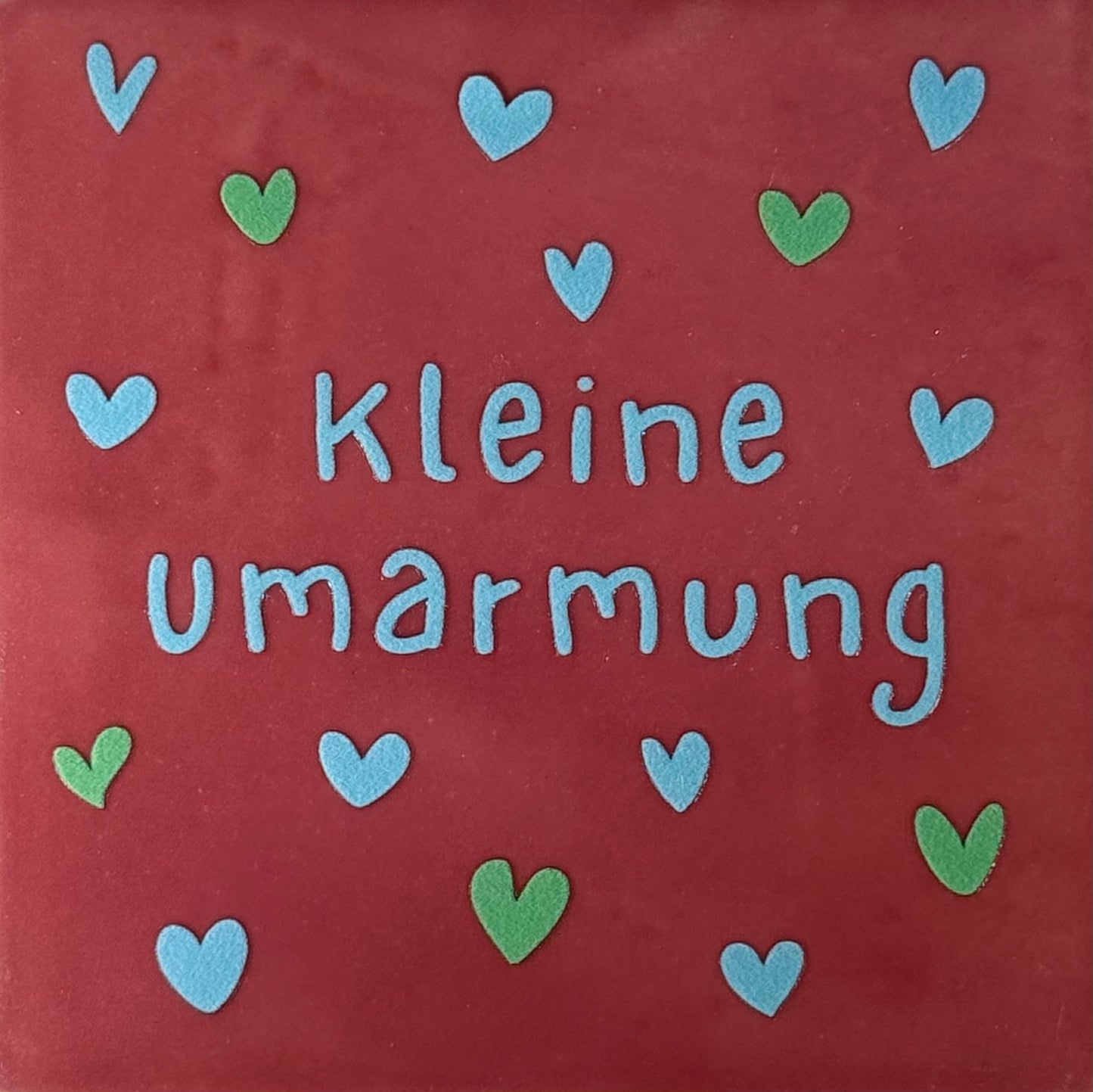 Quote tegeltje 'kleine umarmung' roze/warmblauw(mint)