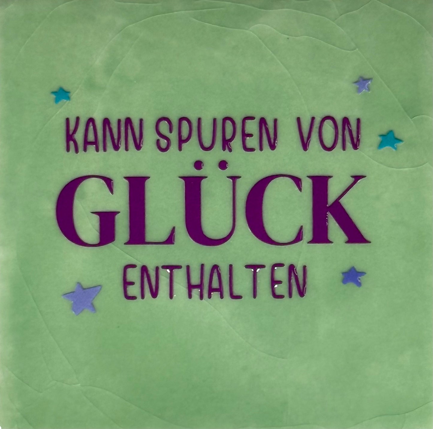 Quote tegeltje 'kann spuren von Glück enthalten' mint/paars(lila-turquoise)
