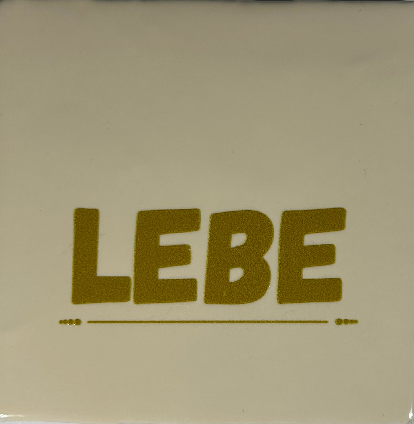 Quote tegeltje 'lebe' (grof) creme/goud