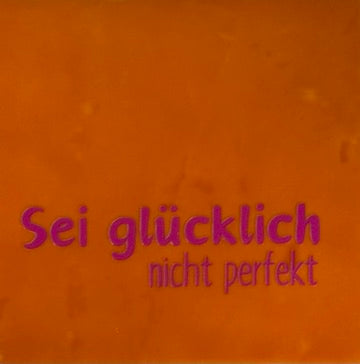 Quote tegeltje 'sei glucklich…' oranje/roze