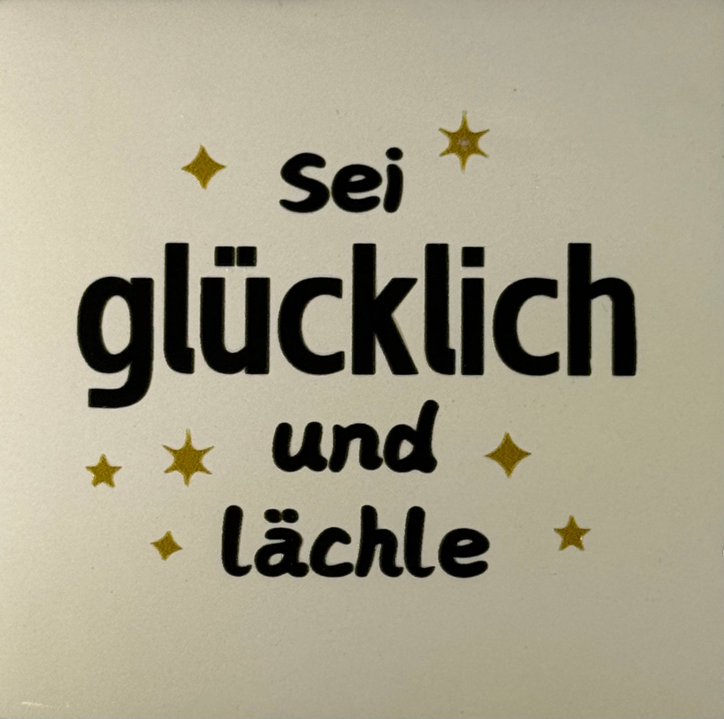 Quote tegeltje 'sei glücklich und lächle' creme/zwart(goud)