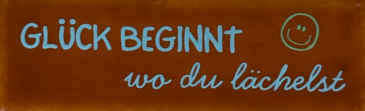 Quote tegeltje DO 'glück beginnt wo du lächelst' terra/warmblauw(mint)