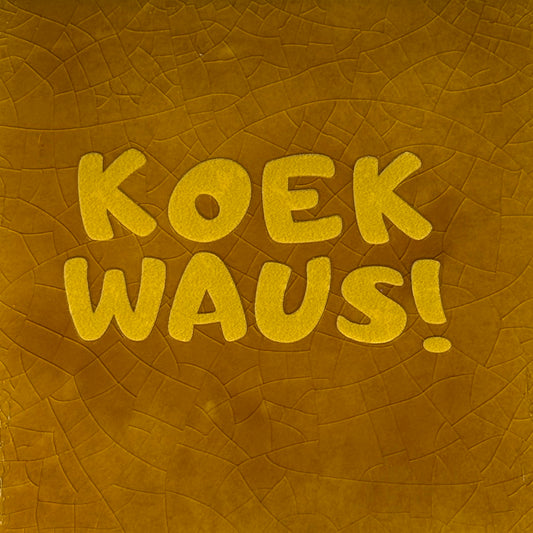 Quote tegeltje 'Koekwaus' nieuw oker/geel