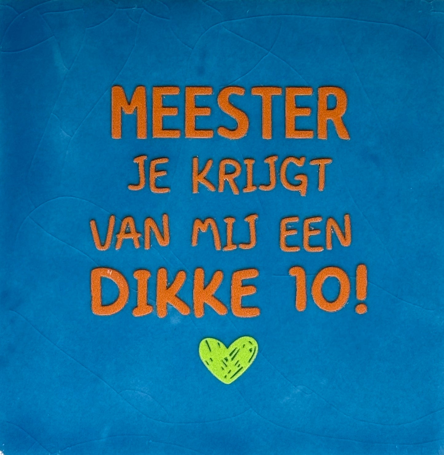 Quote tegeltje 'meester jij krijgt van mij een dikke 10!' lichtblauw/oranje(lime)