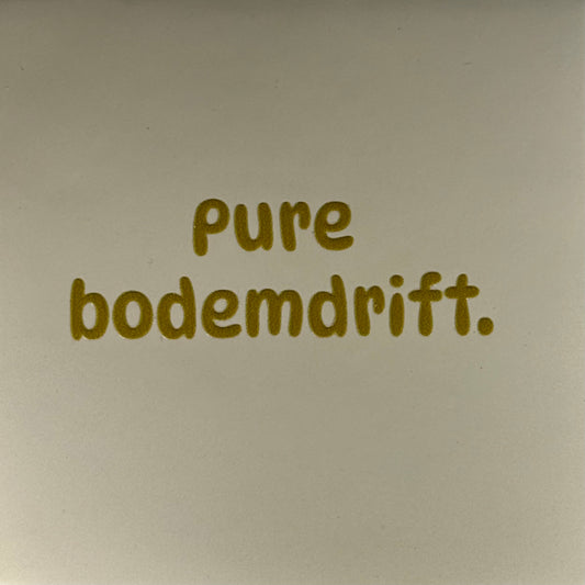 Quote tegeltje 'pure bodemdrift' creme/goud