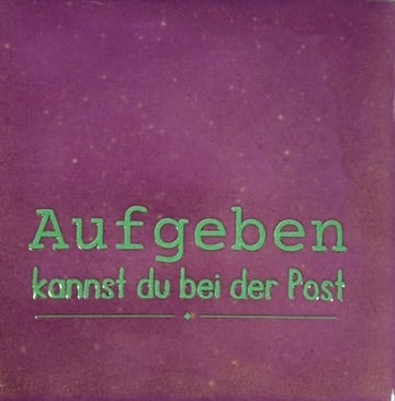 Quote tegeltje 'aufgeben (fijn) kannst du' lila/mint
