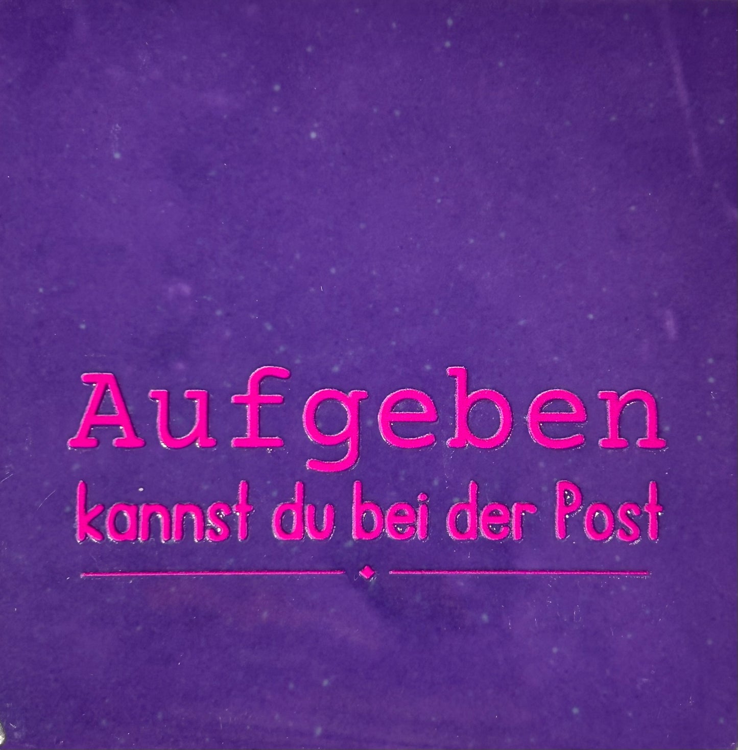 Quote tegeltje 'aufgeben (fijn) kannst du' paars/roze