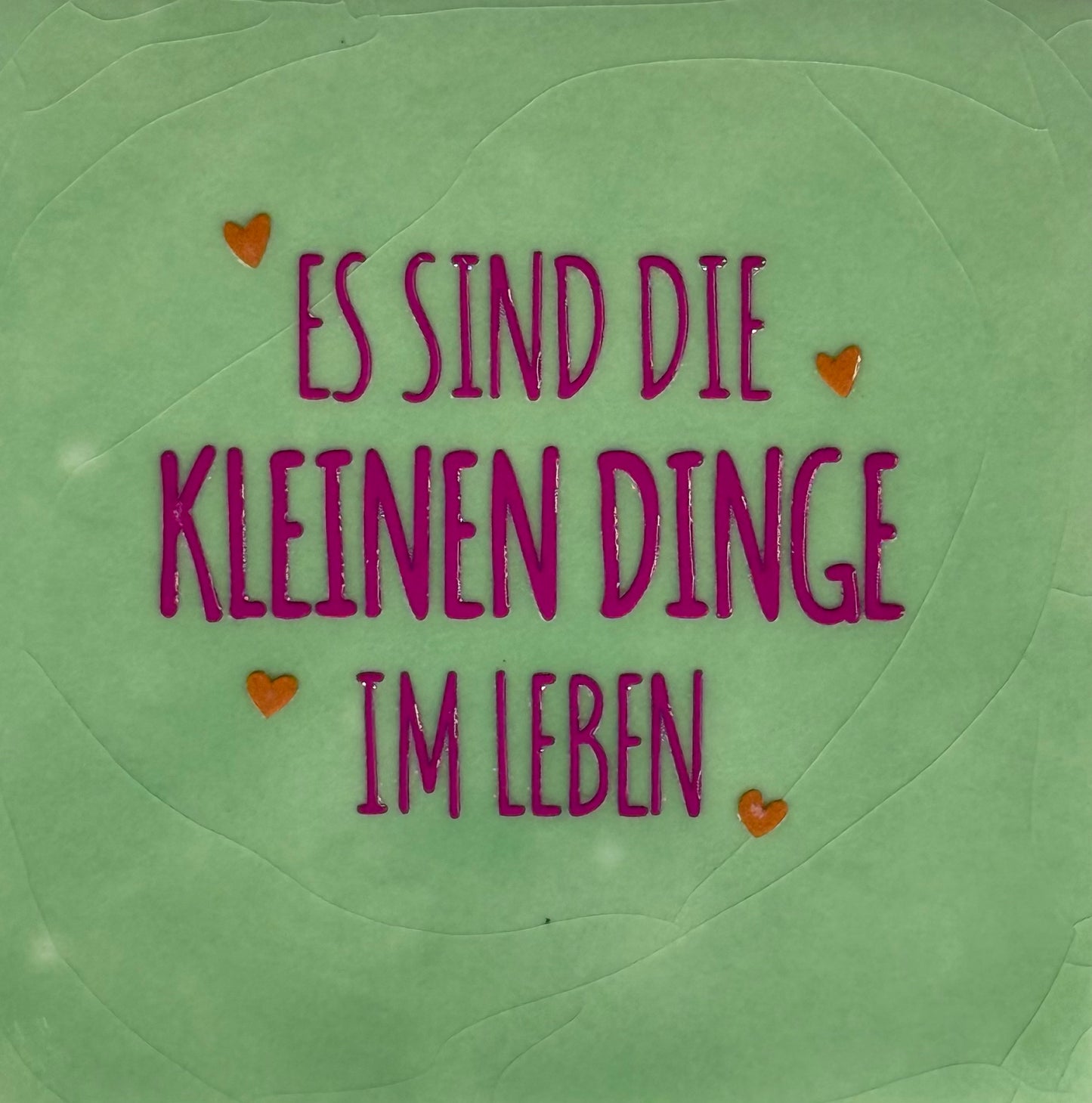 Quote tegeltje 'es sind die kleinen Dinge im leben' mint/knalroze(oranje)