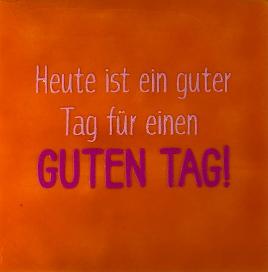 Quote tegeltje 'heute ist ein guter tag...' oranje/knalroze(warmroze)