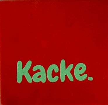 Quote tegeltje 'kacke' rood/mint