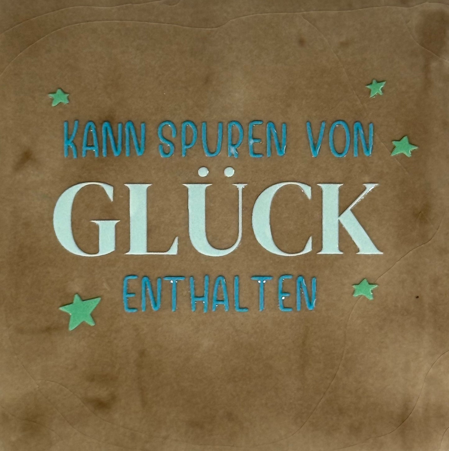 Quote tegeltje 'kann spuren von Glück enthalten' taupe/lichtgroen(turquoise-mint)