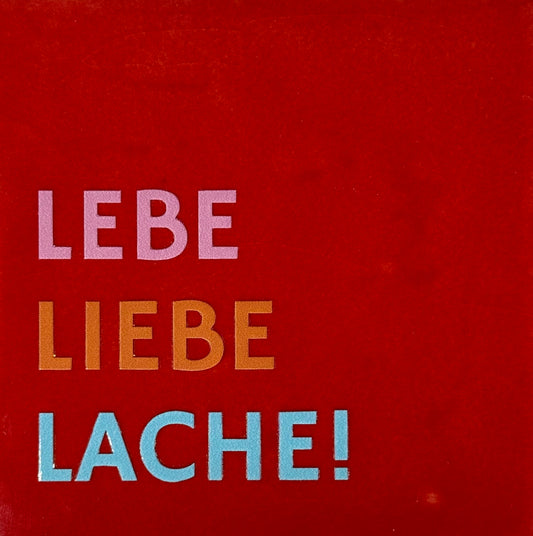 Quote tegeltje 'lebe liebe lache! rood/warmroze (oranje-warmblauw)