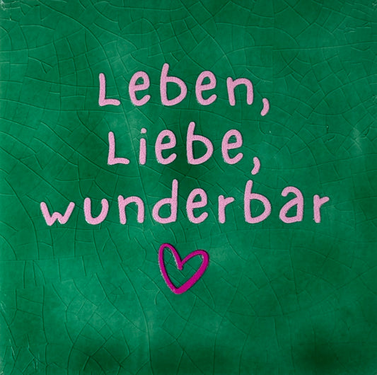 Quote tegeltje 'leben liebe wunderbar' hardgroen/warmroze(knalroze)