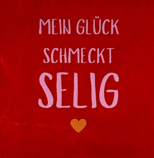 Quote tegeltje 'Mein glück schmeckt selig' rood/warmroze(oranje)