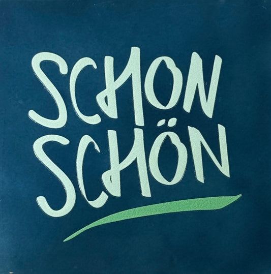 Quote tegeltje 'schon schön' donkerblauw/lichtgroen(mint)