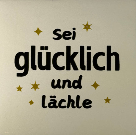 Quote tegeltje 'sei glücklich und lächle' creme/zwart(goud)